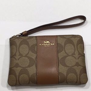 Coach mini purse 6-1/4” x 4-1/8” slightly used.